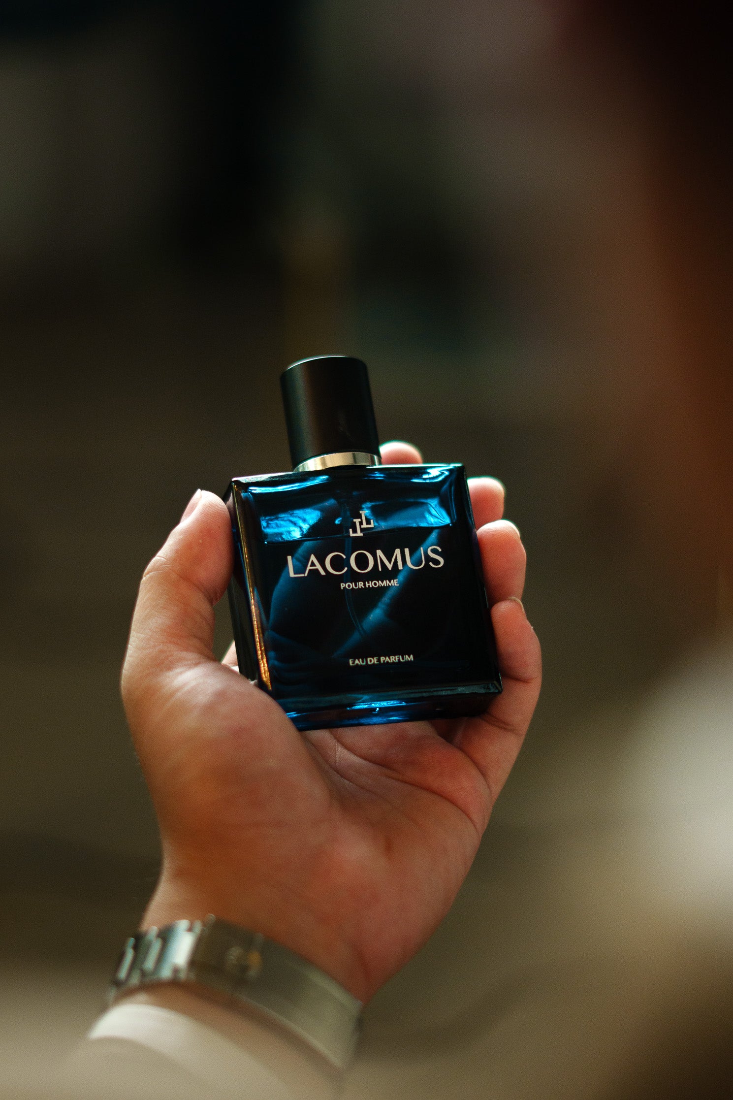 Lacomus artisan fragrance bottle close-up in professional studio photography
